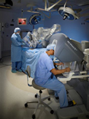 davinci robot used in surgery with doctors